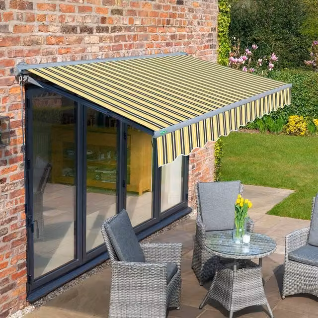 Primrose Half Cassette Electric Retractable Awning with Yellow and Grey Striped Fabric and Charcoal Aluminium Frame, Width: 300 cm