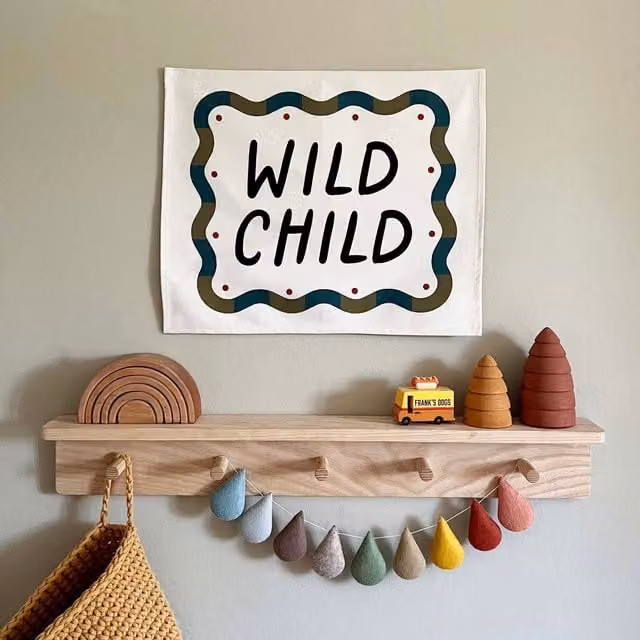 Kid of the Village Wild Child Textile Wall Hanging Banner in Black, Blue, Green and Red, W/D/H: 50 x 40 x 50 cm