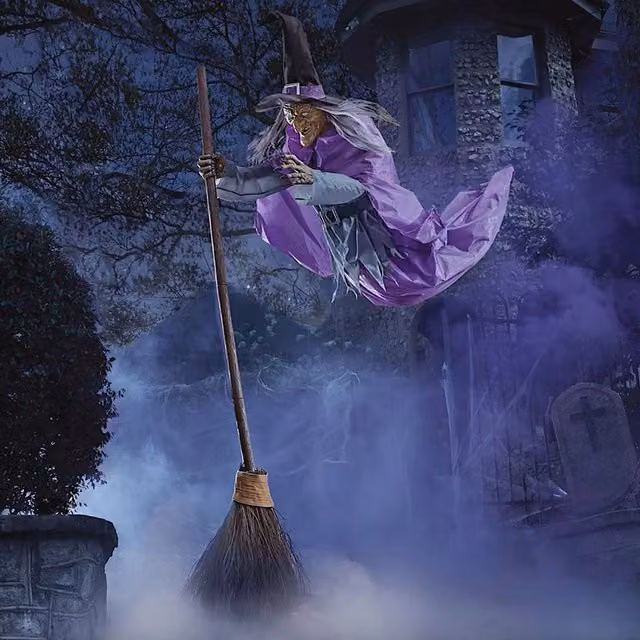 Home Accents Holiday 12ft Giant Animated Hovering Halloween Witch with Broomstick and LEDs in Black and Purple