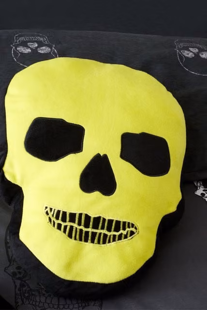 Catherine Lansfield Neon Skull Shaped Kids Halloween Cushion in Yellow and Black